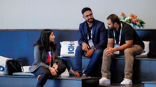 HDI community members chatting together