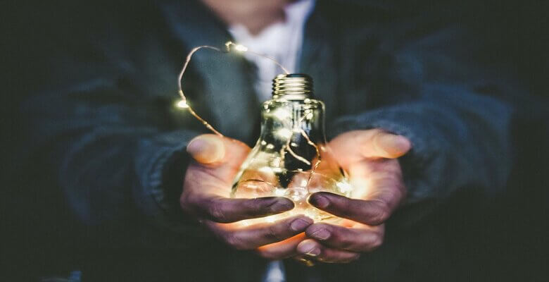 Man holding lightbulb